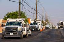 Crews continue to restore power to the still closed Tropicana Avenue area between Topaz Street ...