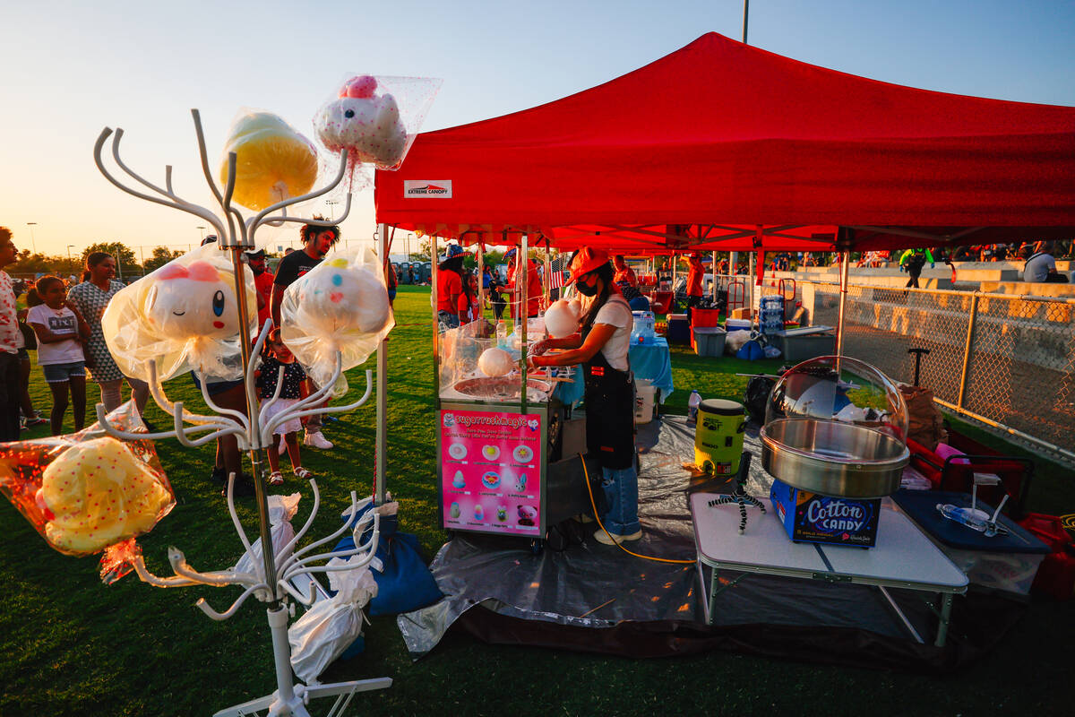 Cotton candy is made during a Fourth of July bash at Heritage Park Friday, July 4, 2025, in Hen ...