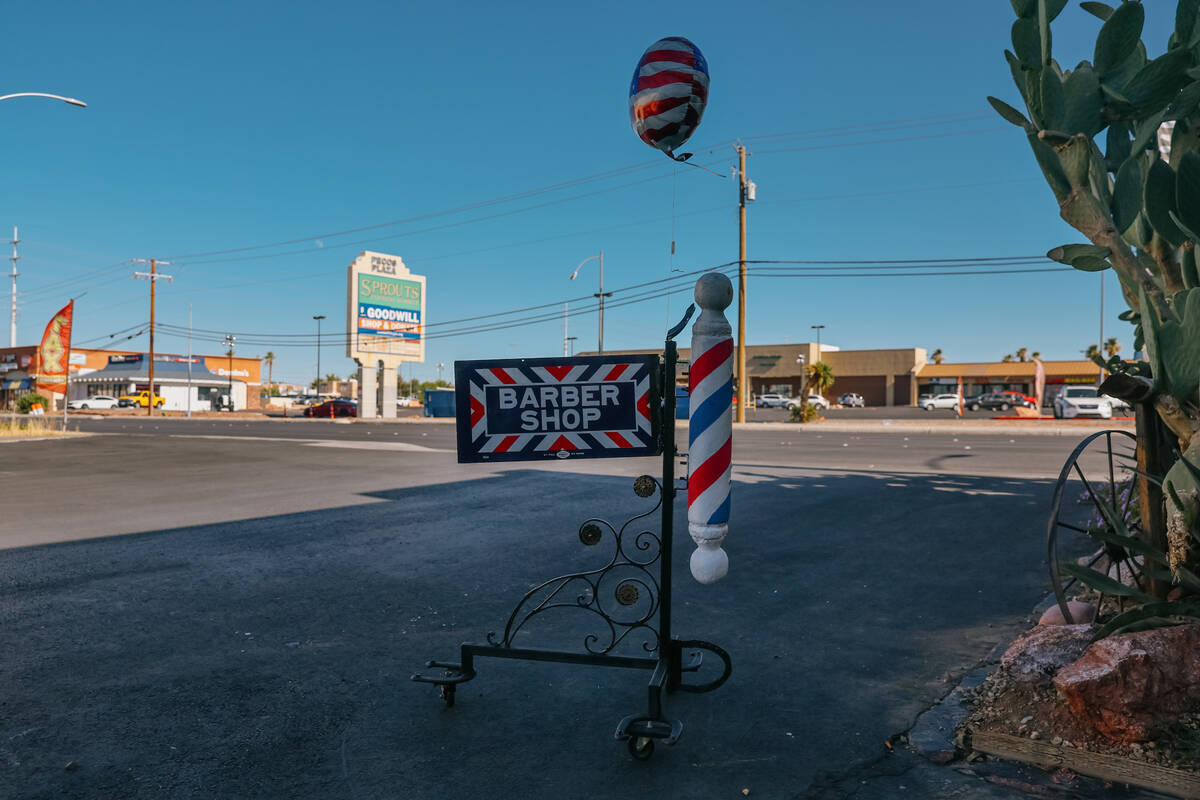 A sign for Cliff’s Barber Corral sits just off of a quiet stretch of the closed-down Tropican ...