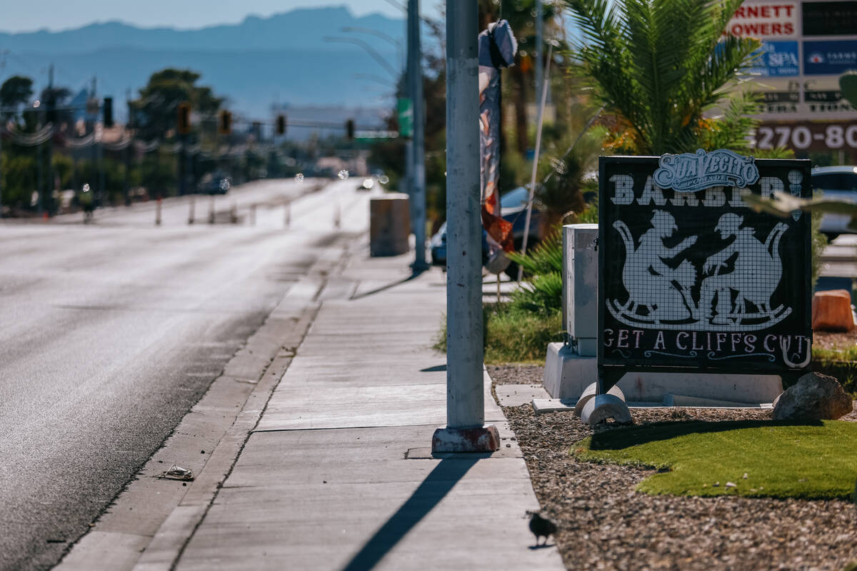 A sign for Cliff’s Barber Corral sits just off of a quiet stretch of the closed-down Tropican ...