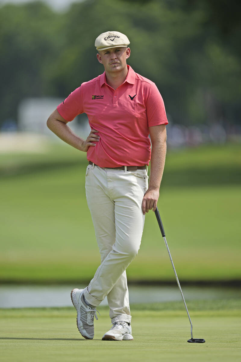 Harry Hall stands on the ninth green before putting in the first round of the Charles Schwab Ch ...