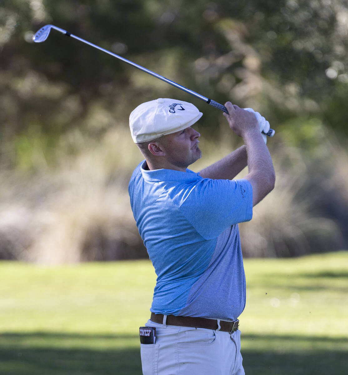 Harry Hall watches his drive to the tenth green during the first round of the Shriners Children ...