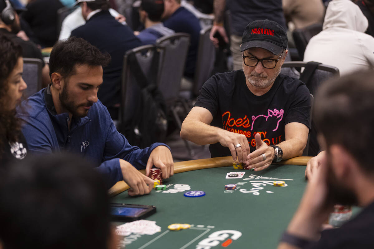 Actor Kevin Pollak checks his chips during day 3 of the World Series of Poker Main Event at Hor ...