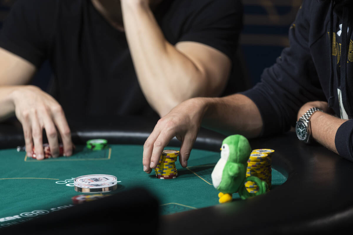 Isaac Rodgin holds his chips during day 3 of the World Series of Poker Main Event at Horseshoe ...