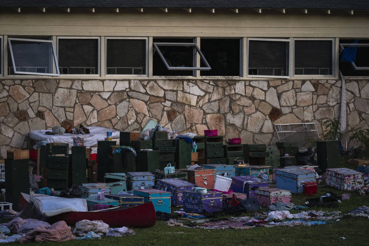 Campers belongings sit outside one of Camp Mystic's cabins near the Guadalupe River after a fla ...