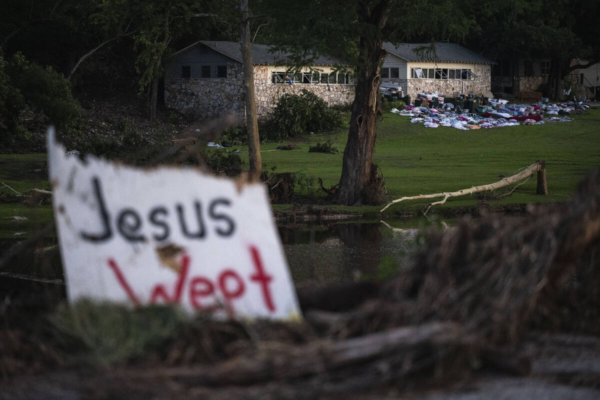 Campers belongings sit outside one of Camp Mystic's cabins near the Guadalupe River, Monday, Ju ...