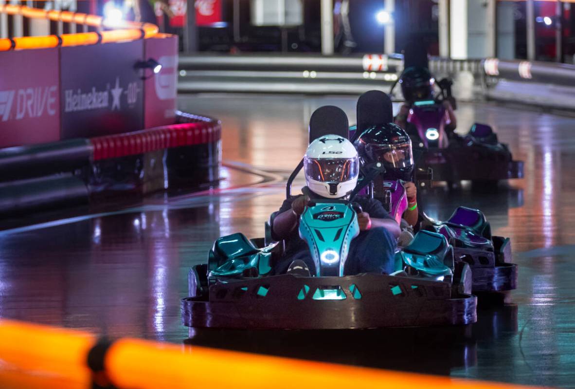 Teens race in a karting session during the first day of the F1 Drive Karting Camp at Grand Prix ...