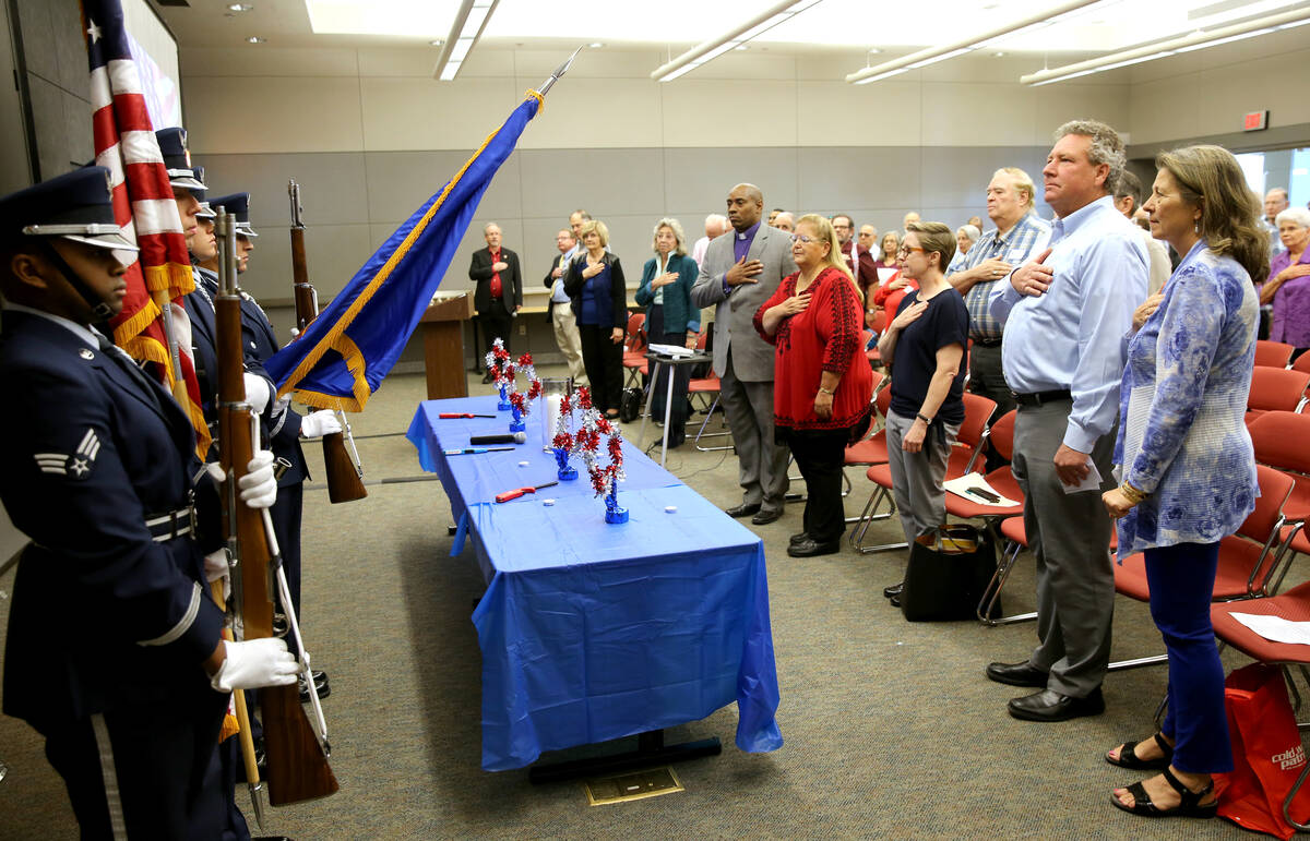 Nellis Air Force Base Honor Guard post the colors during the Official National Day of Remembran ...