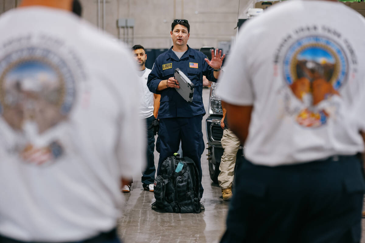Nevada Task Force 1 team leader Matthew Gordon speaks to the 47-person team about to deploy to ...