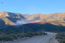 A fire burns east of the 1300 block of Trout Canyon Road on Sunday, July 5, 2025.. (Bryan Horwa ...