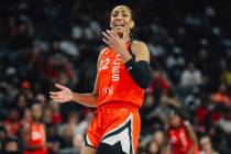 Aces center A'ja Wilson (22) signals to a referee after failing to draw a foul during a WNBA ga ...