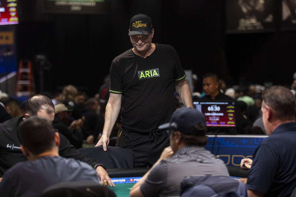 Phil Hellmuth leaves the table after getting knocked out during day 3 of the World Series of Po ...