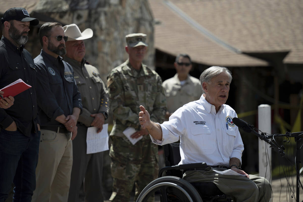 Texas Gov. Greg Abbott speaks during a press conference on Tuesday, July 8, 2025, after touring ...