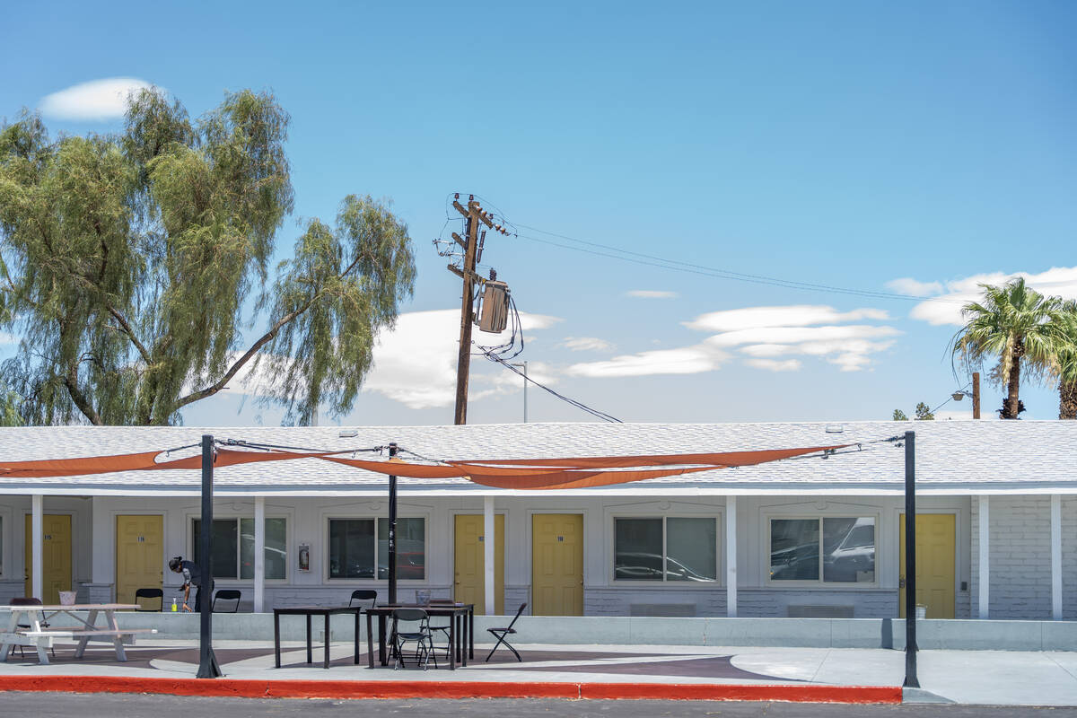 A communal sitting area outside at the Clark County Navigation Center, a converted Motel 6, in ...