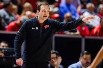 Rebels head coach Kevin Kruger coaches his team during a Mountain West men’s tournament ...