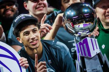Colorado State Rams guard Nique Clifford celebrates winning the Mountain West tournament champi ...