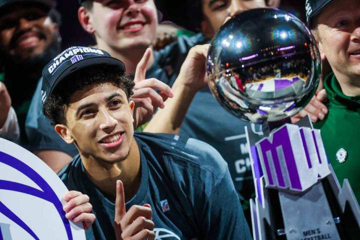 Colorado State Rams guard Nique Clifford celebrates winning the Mountain West tournament champi ...