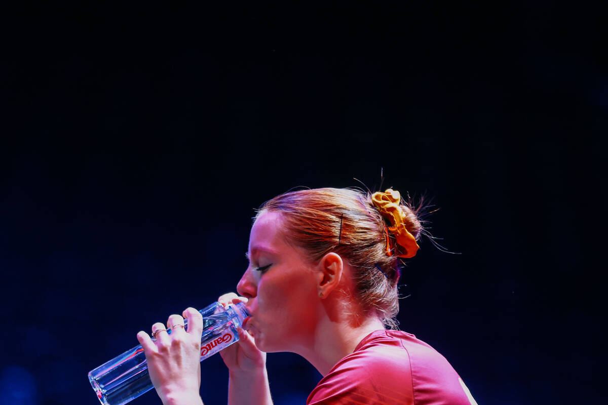 Britt Eerland of the Netherlands drinks water between sets against Satsuki Odo of Japan during ...