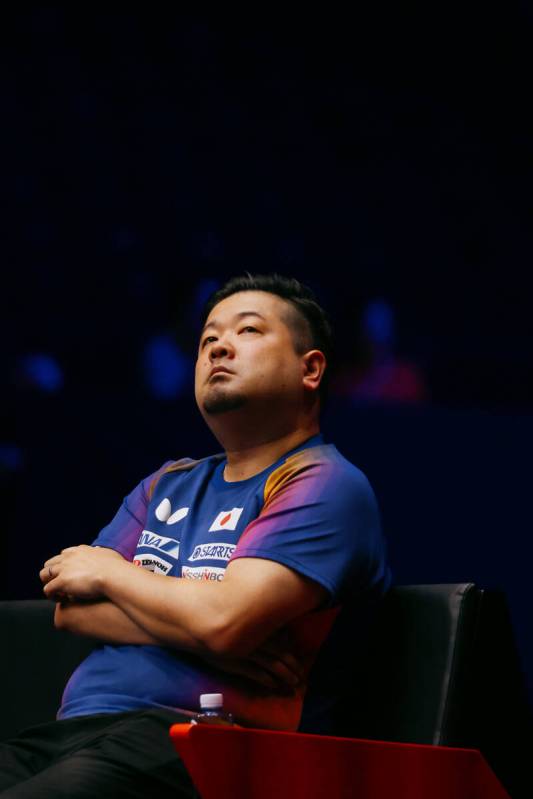 A coach for Satsuki Odo of Japan looks into the crowd after Odo won in the Women’s Singl ...