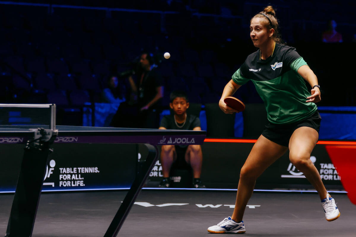Danielle Rauen of Brazil returns a ball to Karolina Pek of Poland during the Women’s Par ...