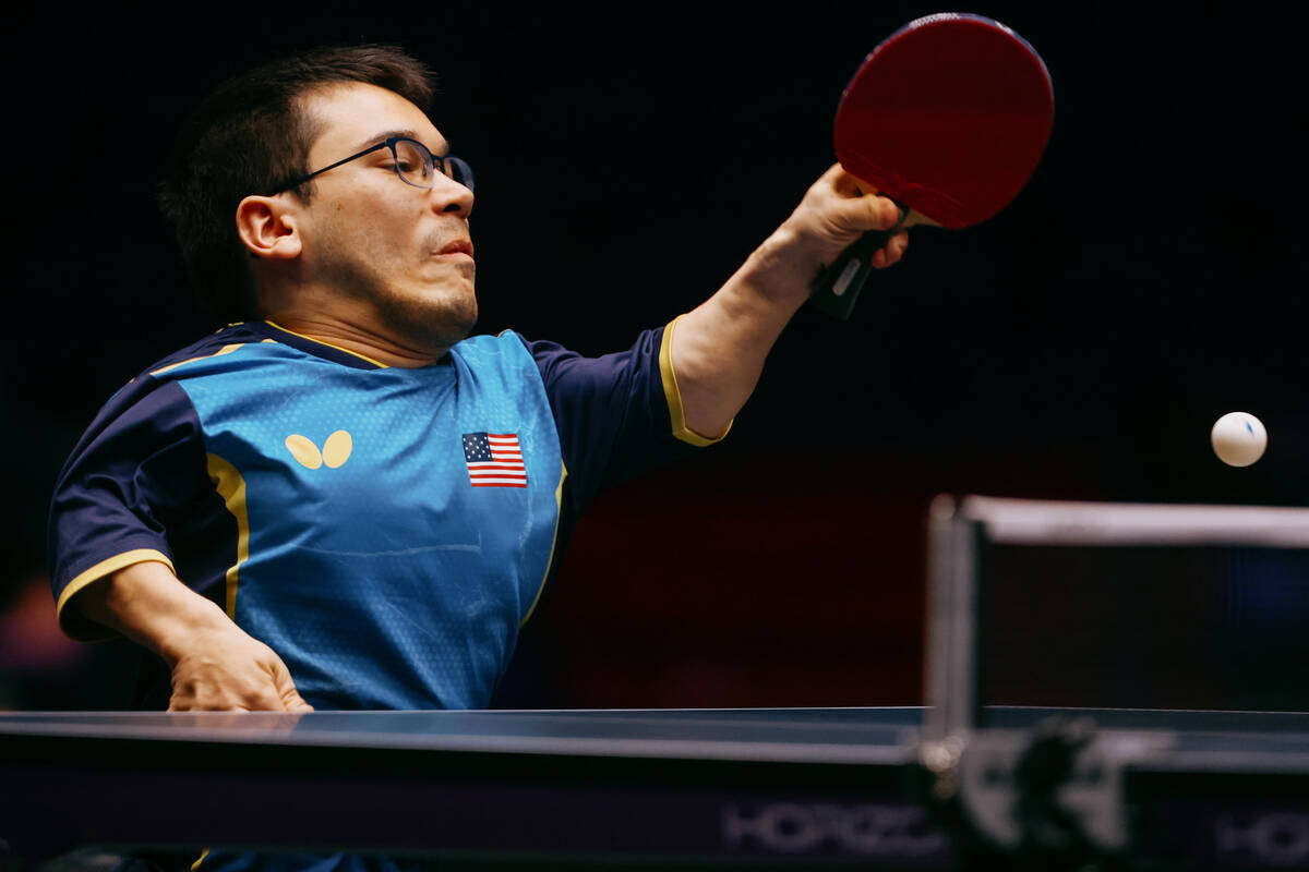 Ian Seidenfeld of the United States plays against Matteo Parenzan of Italy during the Men&#x201 ...