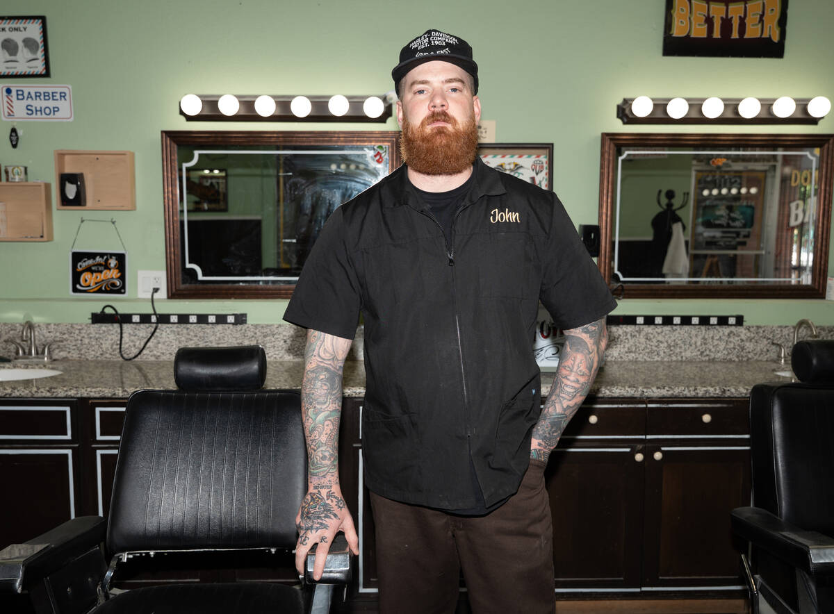 John Hasler, a barber at Downtown Vintage Barber Shop in Las Vegas July 3, 2025. Under the new ...