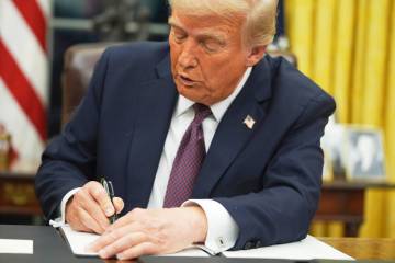 FILE - President Donald Trump signs an executive order on birthright citizenship in the Oval Of ...