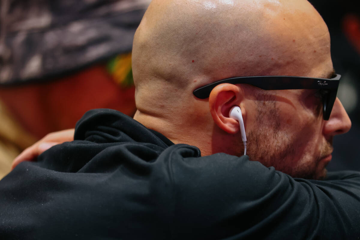 A player keeps earbuds in while playing at day five of the World Series of Poker tournament on ...