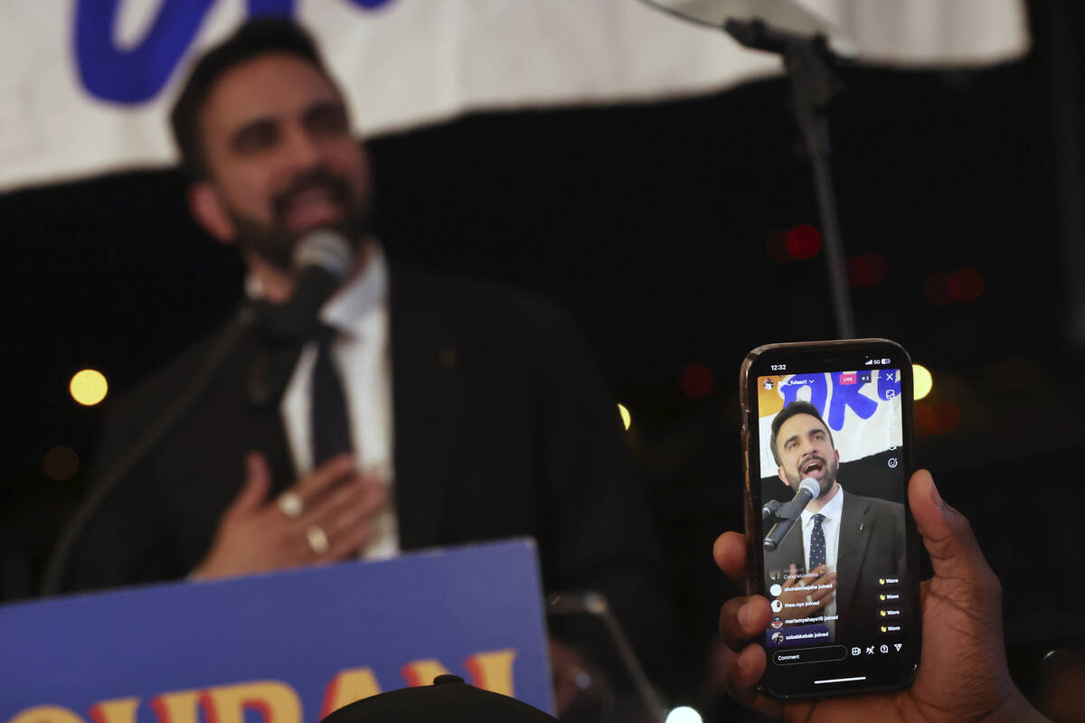 Democratic mayoral candidate Zohran Mamdani is recorded by supporters while he speaks at his pr ...