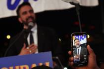 Democratic mayoral candidate Zohran Mamdani is recorded by supporters while he speaks at his pr ...