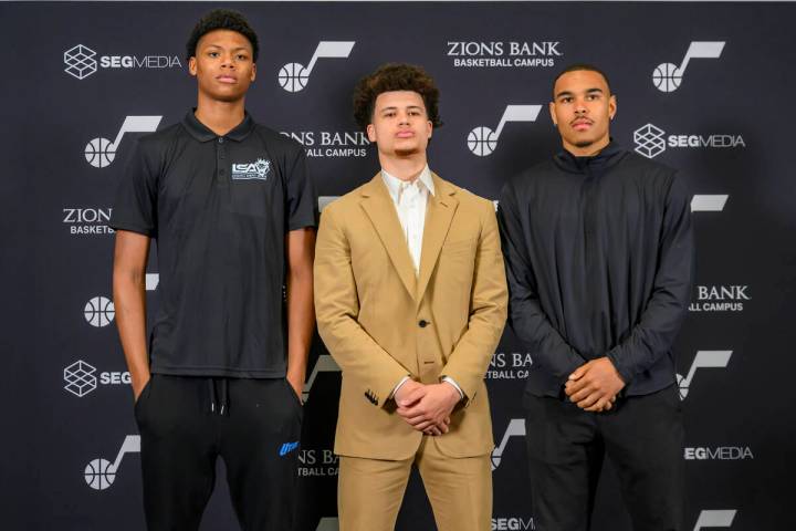 Utah Jazz drafted players, left to right, Ace Bailey, Walter Clayton Jr. and John Tonje, pose t ...