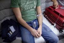 A patient is hooked up to an IV for a hangover treatment in Las Vegas on Sunday, April 15, 2012 ...