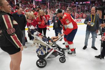 Florida Panthers defenseman Nate Schmidt (88) celebrates with his family after wining the Stanl ...