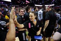San Antonio Spurs coach Becky Hammon celebrates with her team after they defeated the Phoenix S ...