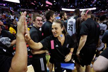 San Antonio Spurs coach Becky Hammon celebrates with her team after they defeated the Phoenix S ...
