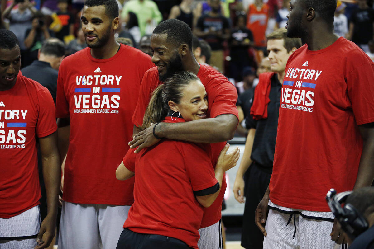 San Antonio Spurs coach Becky Hammon hugs Jonathan Simmons after they defeated Phoenix Suns in ...