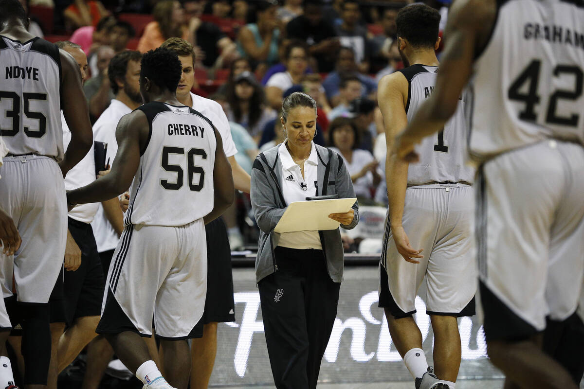 Becky Hammon coaches the San Antonio Spurs against the Atlanta Hawks during the second half of ...