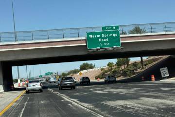 Traffic moves along a stretch of the 215 Beltway westbound near Warm Springs Road on Friday, Ju ...