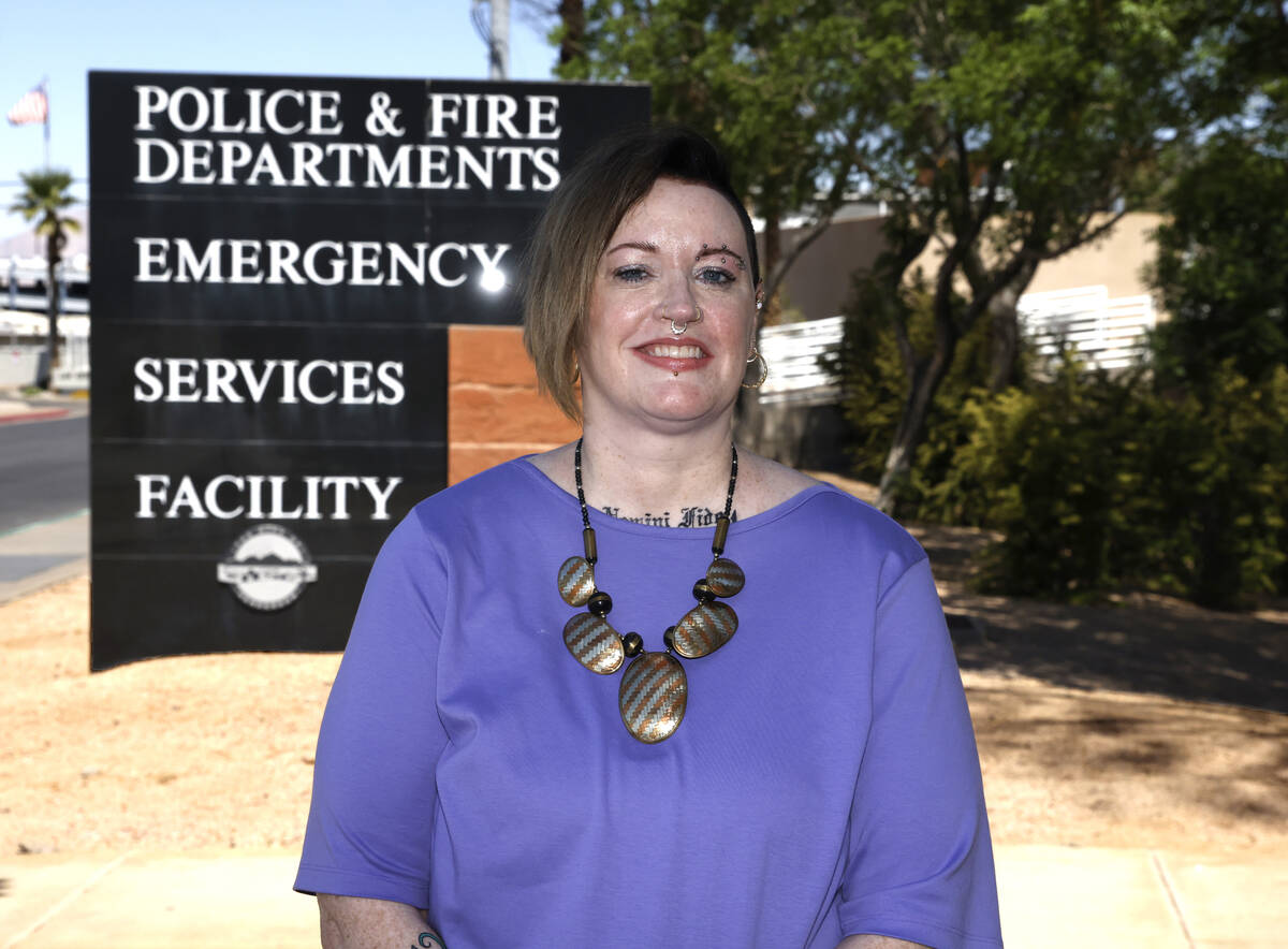 Amanda Swartz, who was recently fired from her volunteer position with Henderson police, poses ...