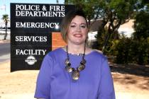Amanda Swartz, who was recently fired from her volunteer position with Henderson police, poses ...