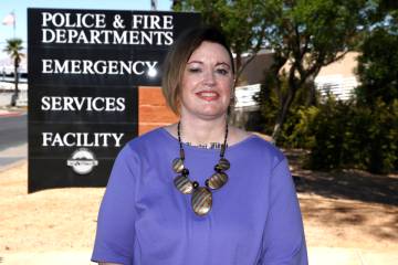 Amanda Swartz, who was recently fired from her volunteer position with Henderson police, poses ...