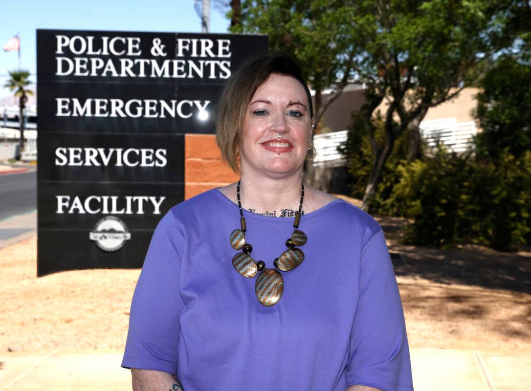 Amanda Swartz, who was recently fired from her volunteer position with Henderson police, poses ...