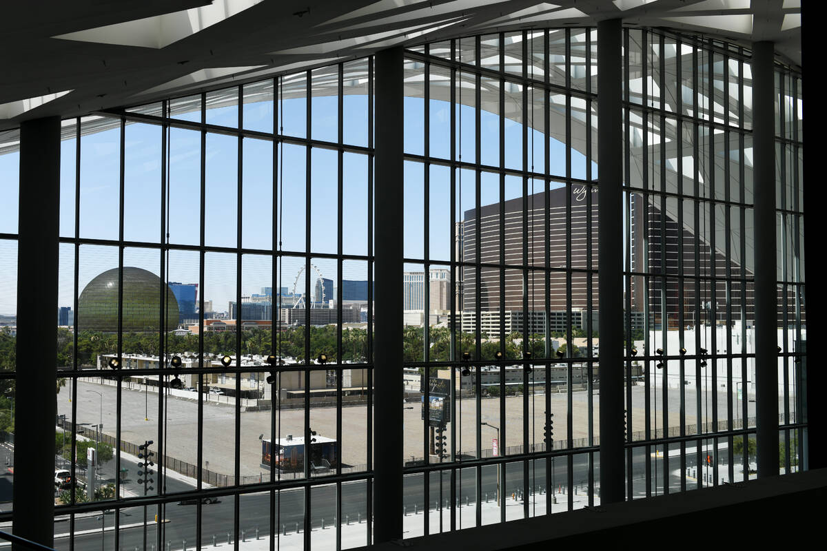 A vacant lot for the planned Majestic Hotel is seen through the windows of the Las Vegas Conven ...