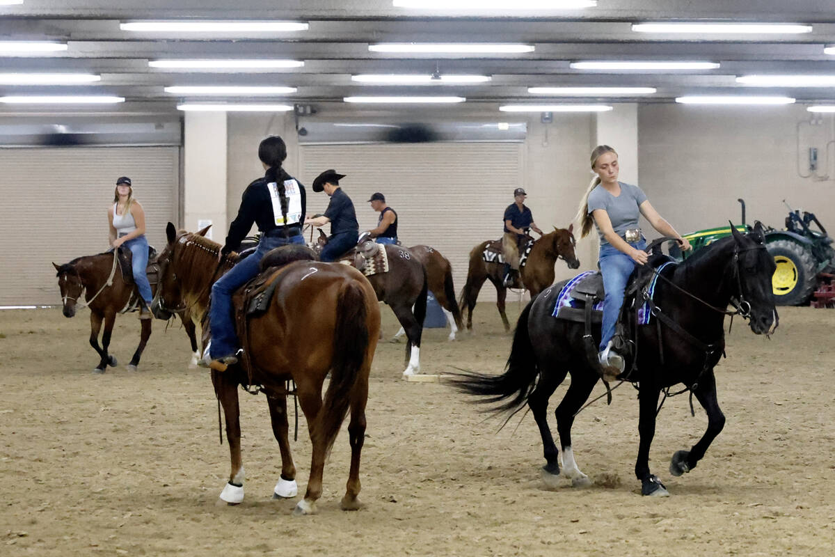 Competitors, including Avery Figgins, front left, and her sister Alisa, right, both of Californ ...