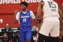 Orlando Magic guard Jase Richardson (11) motions to teammates while playing the Sacramento King ...