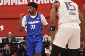 Orlando Magic guard Jase Richardson (11) motions to teammates while playing the Sacramento King ...