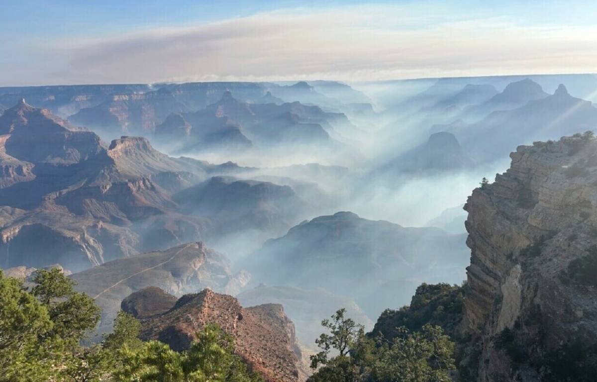 Smoke from wildfires settles over Grand Canyon National Park in northern Arizona on Friday, Jul ...