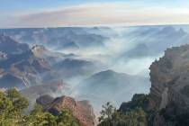 Smoke from wildfires settles over Grand Canyon National Park in northern Arizona on Friday, Jul ...