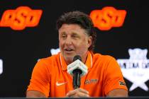 Oklahoma State head coach Mike Gundy speaks during the Big 12 NCAA college football media days ...
