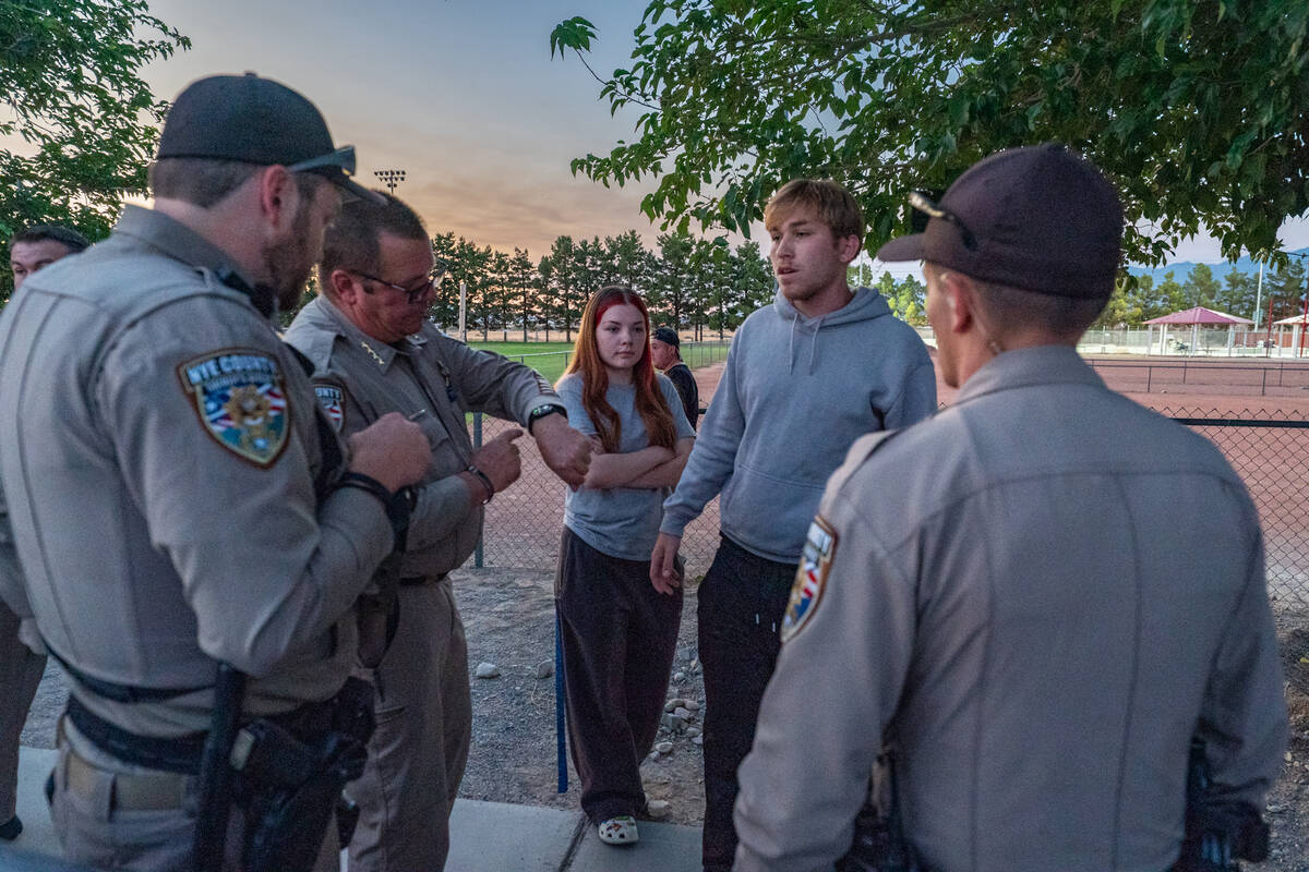 Nye County Sheriff Joe McGill and his deputies escorted an unidentified male from the proceedin ...